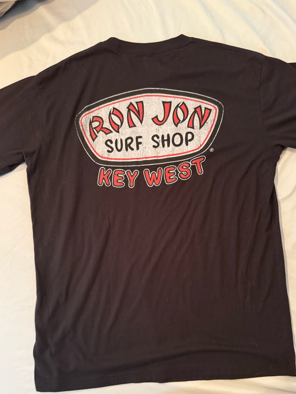 Men’s ron jon xl black logo tee.